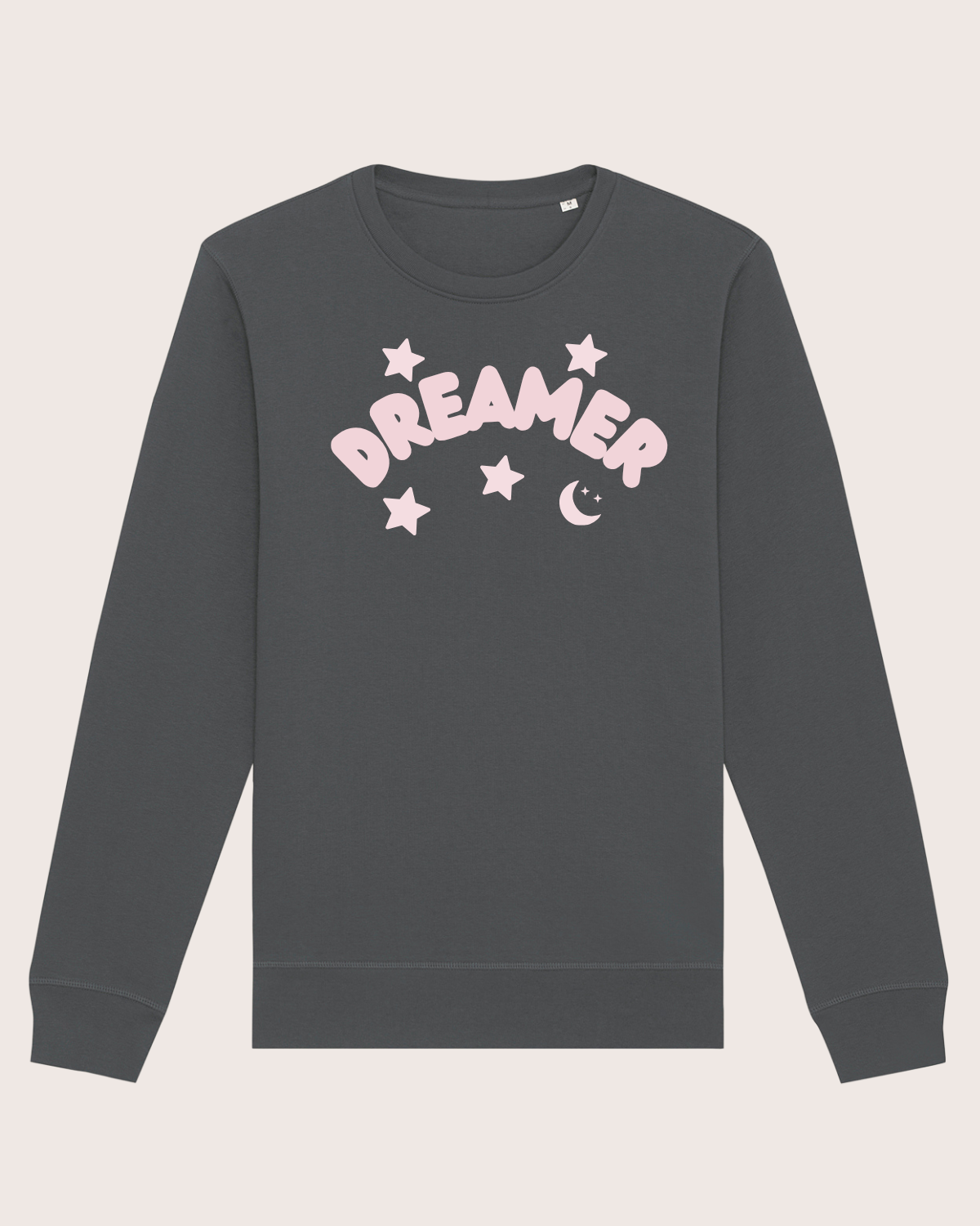 Dark gray sweatshirt with 'DREAMER' printed in pink on a light beige background